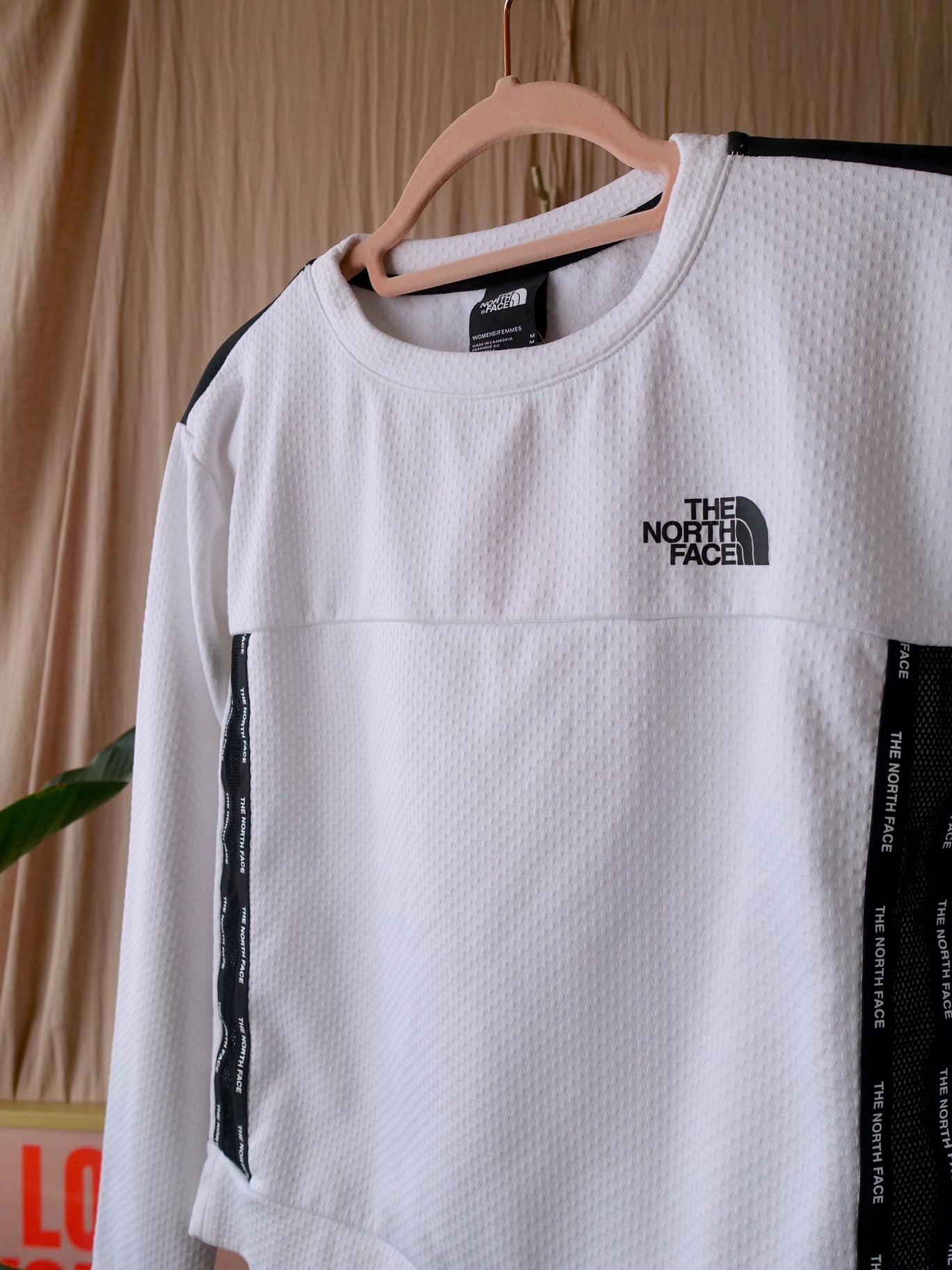 The North Face cropped mesh sweater wit / zwart