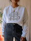 Melting Stockholm embroidered sweater light grey