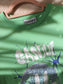 Ganni disco smiley tee pastel green
