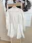 NIKKIE broderie anglaise ruffle jurk wit