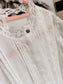 NIKKIE broderie anglaise ruffle jurk wit