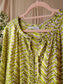 Mondieux Madame peplum detail top lime