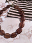 Zusss SS26 kralenketting donkerbruin