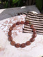 Zusss SS26 kralenketting donkerbruin