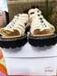 Sandro Eliane lizard effect sandalen ecru